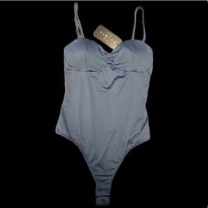 NWT 21 Saints satin bodysuit with padding/support size L (adult M-L)